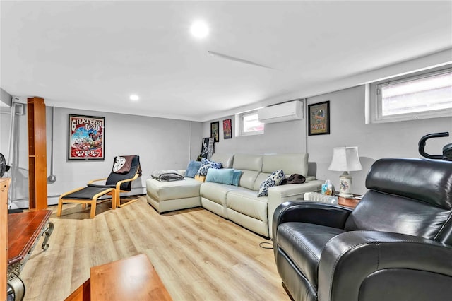 living area featuring recessed lighting, a healthy amount of sunlight, wood finished floors, and a wall unit AC