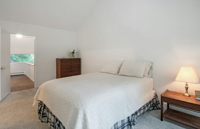 707 Eagle Bay Dr, Ossining, NY 10562 - bedroom with a baseboard heating unit, carpet, and vaulted ceiling