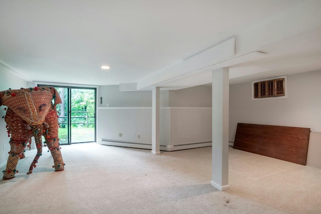 707 Eagle Bay Dr, Ossining, NY 10562 - basement with carpet, recessed lighting, a baseboard heating unit, and baseboards