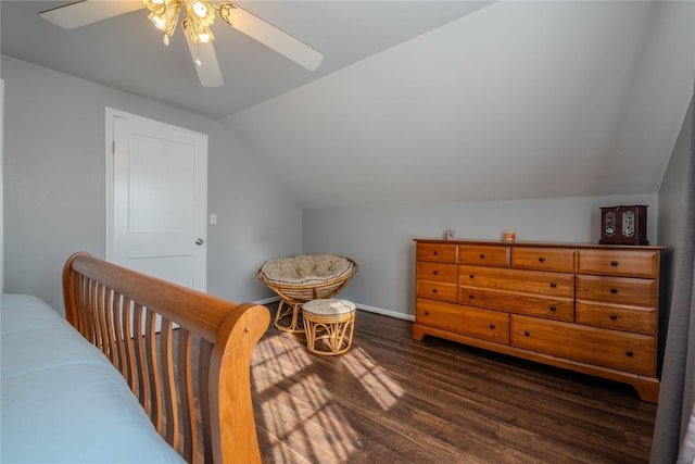 bedroom featuring ceiling fan, baseboards, lofted ceiling, and wood finished floors