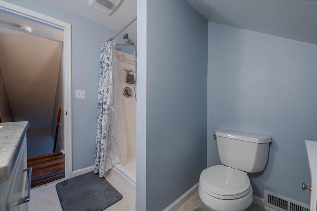 bathroom with visible vents, baseboards, toilet, and a shower stall