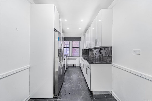 kitchen with white cabinets, recessed lighting, stainless steel fridge with ice dispenser, and tasteful backsplash