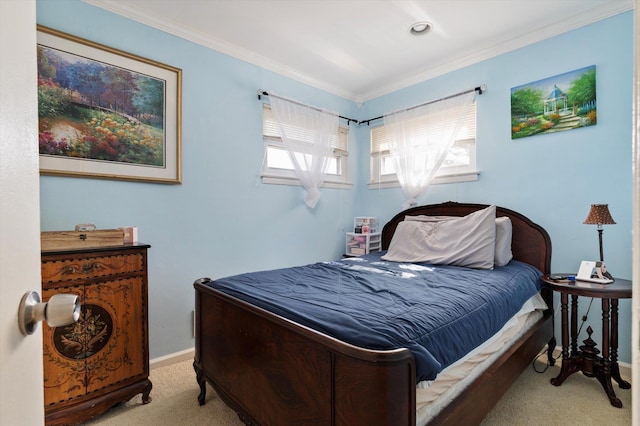 bedroom with baseboards, carpet, and crown molding