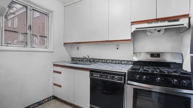 kitchen with under cabinet range hood, a sink, black dishwasher, gas stove, and light countertops