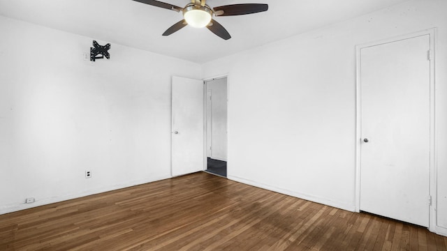 unfurnished bedroom featuring hardwood / wood-style flooring and ceiling fan