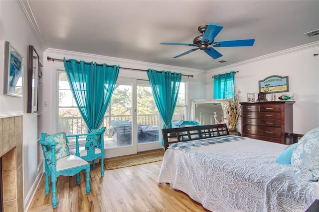301 Lewis Walk, Cherry Grove, NY 11782 - bedroom featuring baseboards, ornamental molding, visible vents, access to exterior, and wood finished floors