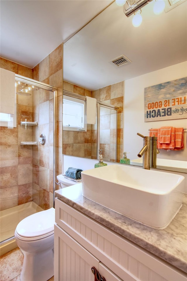 301 Lewis Walk, Cherry Grove, NY 11782 - full bath featuring a shower stall, vanity, visible vents, and toilet