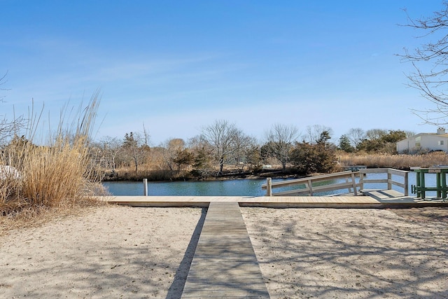 dock area featuring a water view