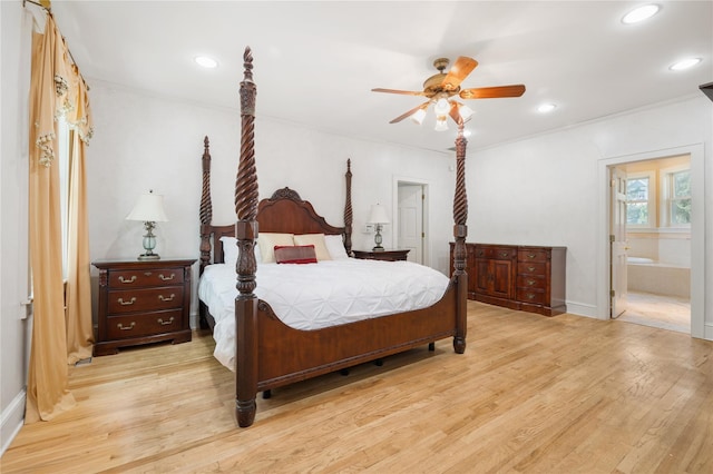 bedroom with recessed lighting, baseboards, ensuite bathroom, and light wood finished floors