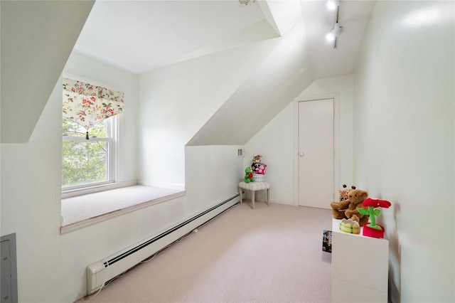 66 Drake Rd, Scarsdale, NY 10583 - bonus room featuring a baseboard radiator, vaulted ceiling, and carpet floors