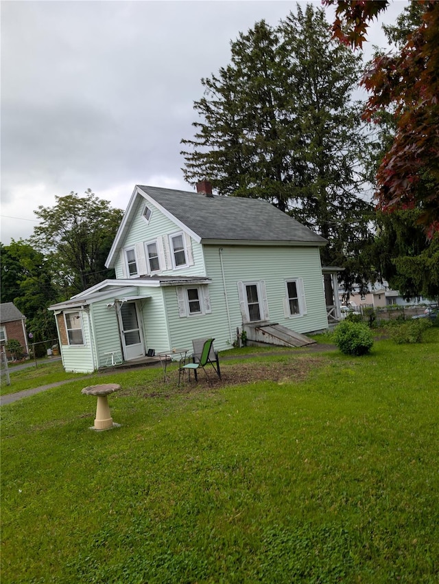 45 Clancy Ave, New Windsor, NY 12553 - rear view of house with a chimney