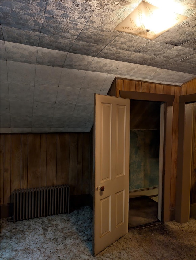 45 Clancy Ave, New Windsor, NY 12553 - bonus room featuring radiator heating unit, carpet flooring, wooden walls, and vaulted ceiling
