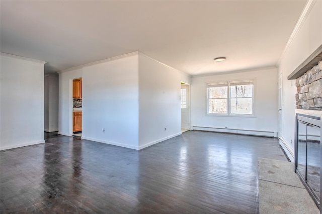 unfurnished living room with crown molding, baseboards, a baseboard heating unit, dark wood-type flooring, and baseboard heating