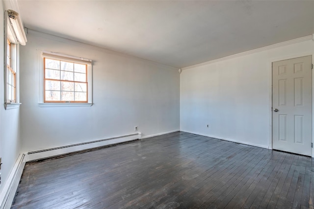 spare room featuring a baseboard heating unit, crown molding, baseboards, baseboard heating, and dark wood-style flooring