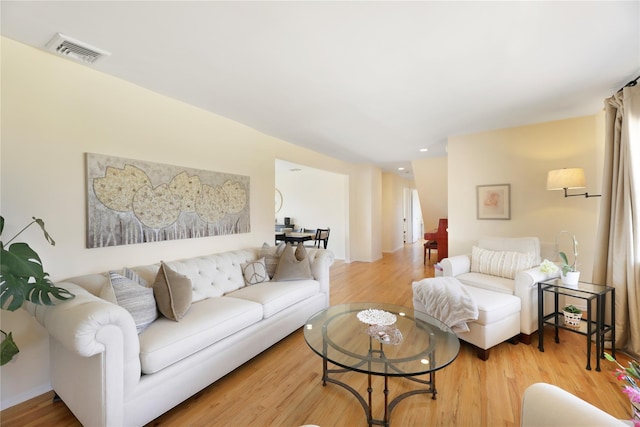118 Paquatuck Ave, East Moriches, NY 11940 - living room with visible vents, recessed lighting, and wood finished floors