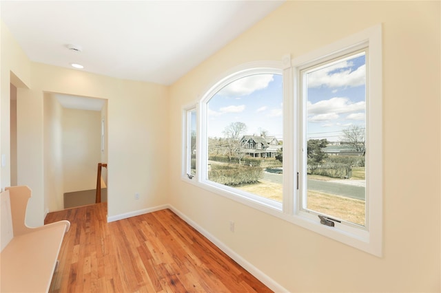 118 Paquatuck Ave, East Moriches, NY 11940 - spare room with baseboards and light wood finished floors