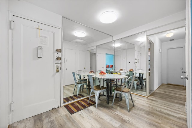 dining room featuring light wood-style floors