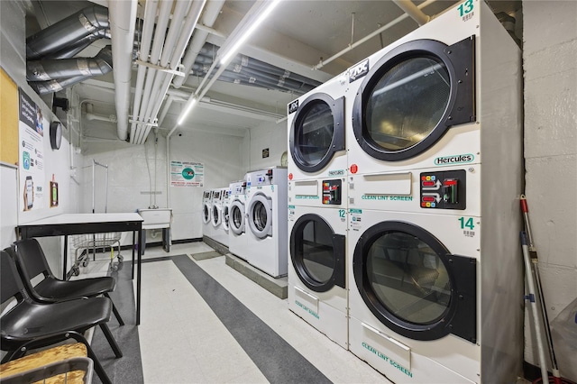 common laundry area with tile patterned floors, stacked washing maching and dryer, and separate washer and dryer