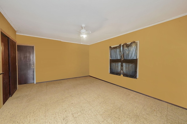 unfurnished room with light floors, baseboards, crown molding, and a ceiling fan