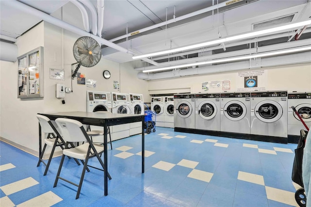 180 W End Ave Unit 23G, New York Manhattan, NY 10023 - community laundry room with washer and clothes dryer and tile patterned floors