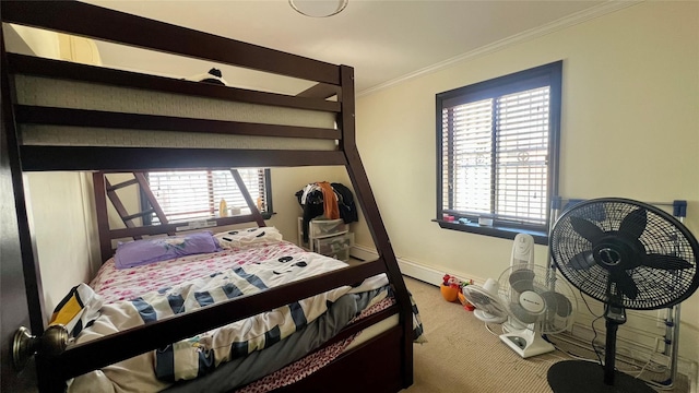 bedroom with carpet flooring, baseboards, and ornamental molding