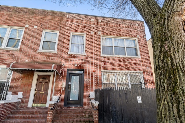 multi unit property featuring brick siding