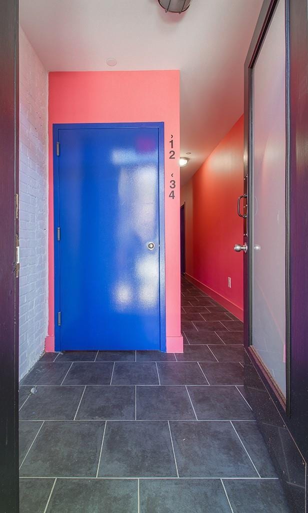 hall featuring tile patterned floors
