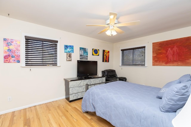 4 Park Pl, Oyster Bay, NY 11771 - bedroom featuring a ceiling fan, baseboards, and light wood finished floors