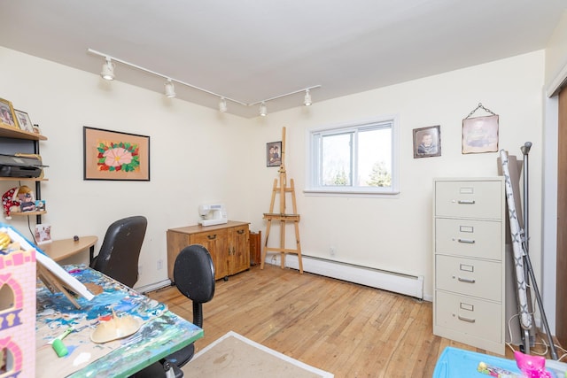 4 Park Pl, Oyster Bay, NY 11771 - office with a baseboard heating unit and light wood finished floors