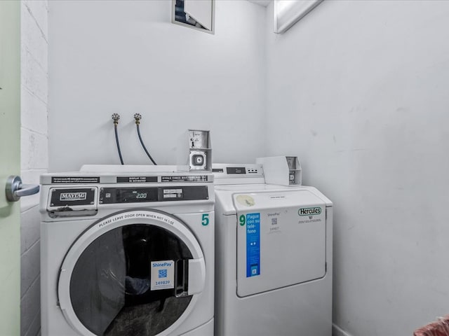 laundry room featuring washer and dryer