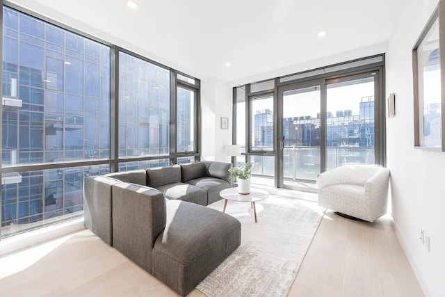 33-66 Farrington St Unit 15G, Flushing, NY 11354 - living room with a city view, a wall of windows, and wood finished floors