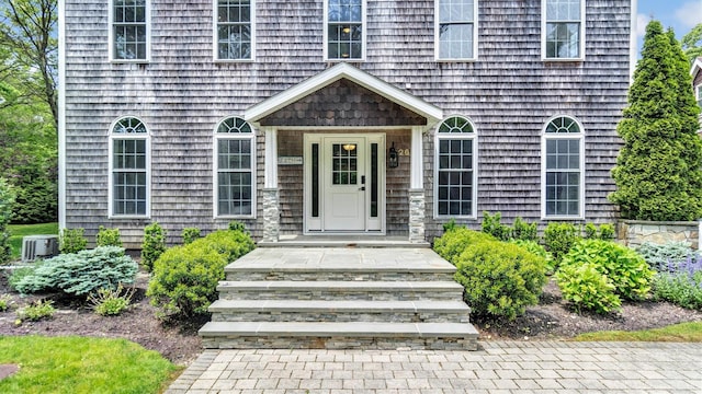 26 Boxtree Rd, East Quogue, NY 11942 - entrance to property featuring central air condition unit