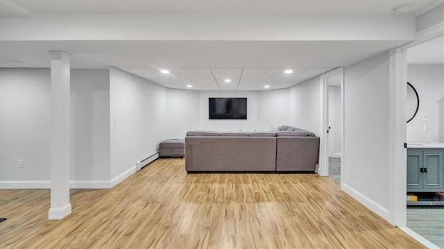 26 Boxtree Rd, East Quogue, NY 11942 - living area featuring baseboard heating, light wood-style floors, baseboards, and recessed lighting