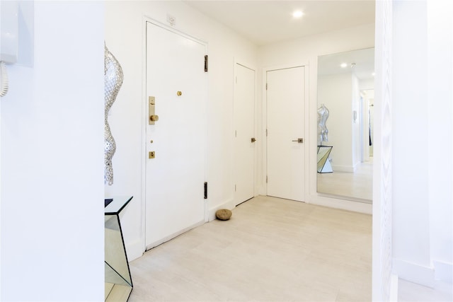 interior space with recessed lighting and light wood-style floors