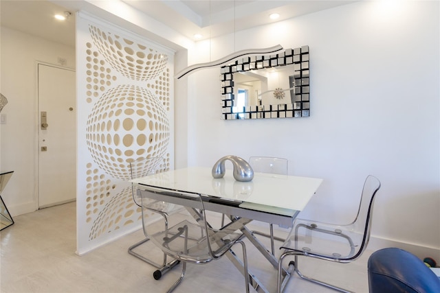 dining space featuring recessed lighting and wood finished floors