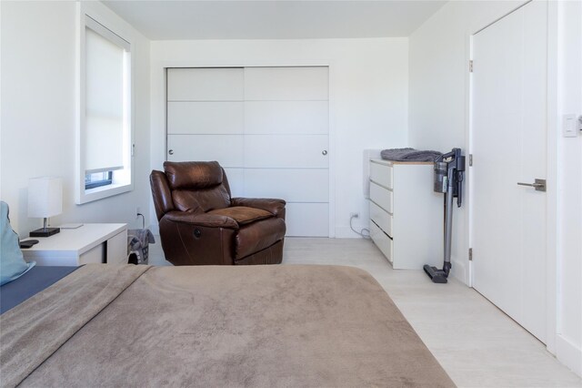 bedroom with light wood-type flooring