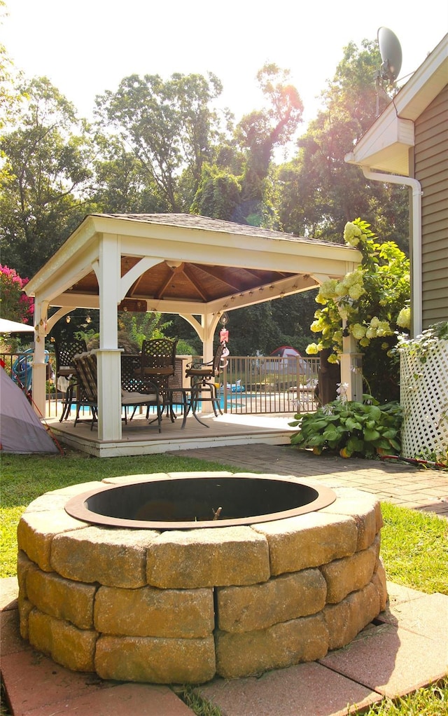 view of patio with a gazebo and fence