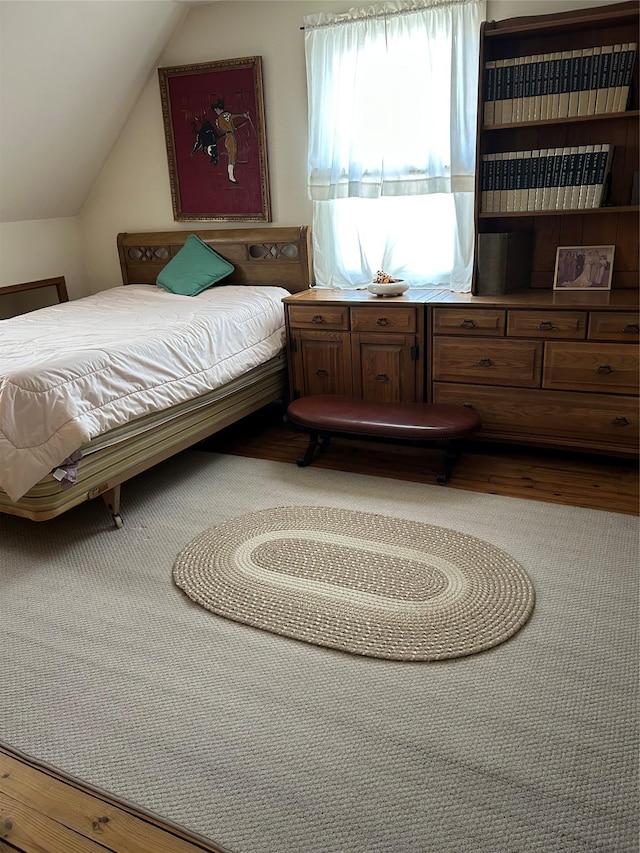 bedroom with vaulted ceiling