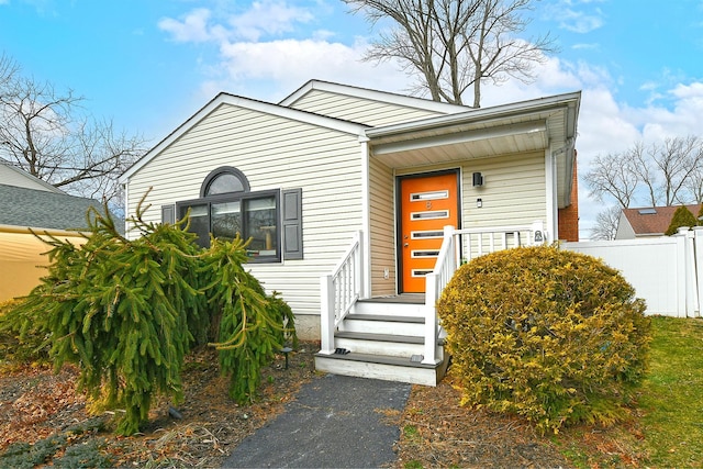 view of front of house with fence