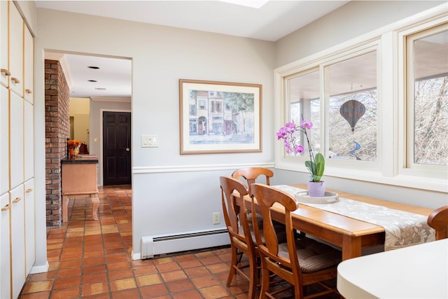 dining room with a baseboard radiator