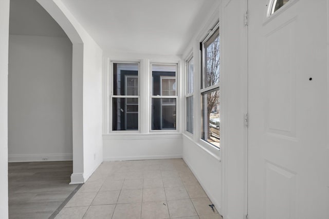 interior space featuring arched walkways