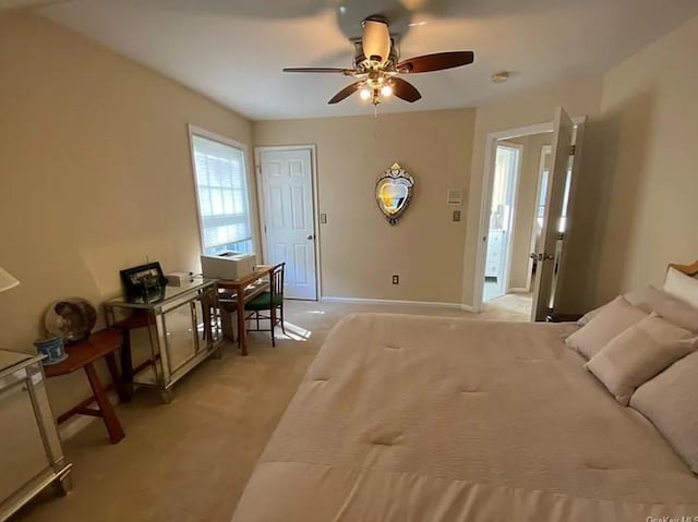 bedroom with light carpet, a ceiling fan, and baseboards