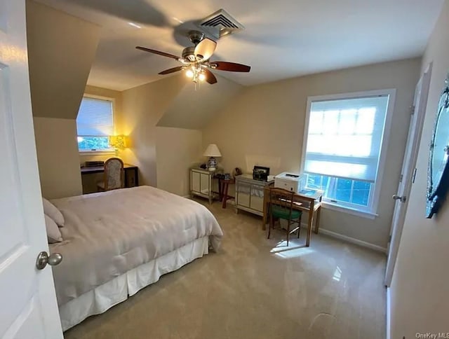 bedroom featuring a ceiling fan, baseboards, visible vents, and carpet floors