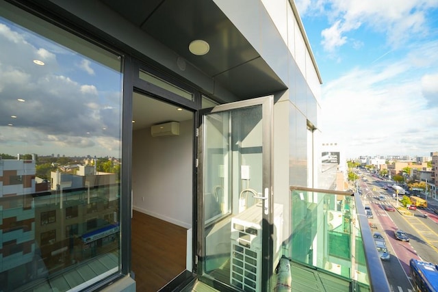 balcony with an AC wall unit