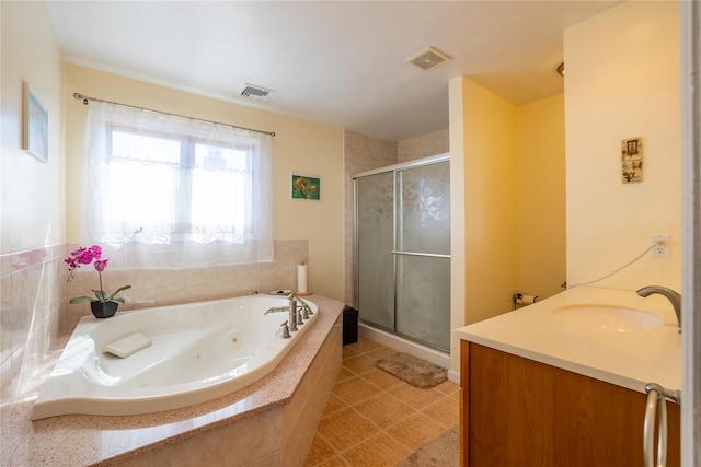 full bath featuring visible vents, a jetted tub, and a shower stall