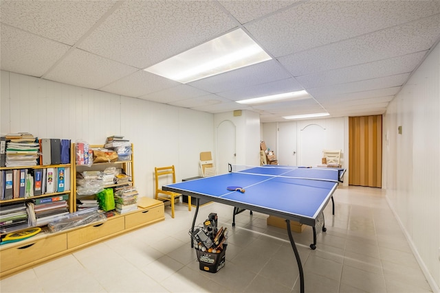 playroom featuring a paneled ceiling