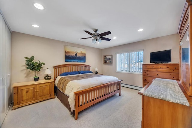 bedroom with ceiling fan, light carpet, recessed lighting, and a baseboard radiator