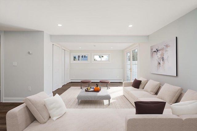 living area featuring recessed lighting, a baseboard radiator, baseboards, and dark wood-type flooring