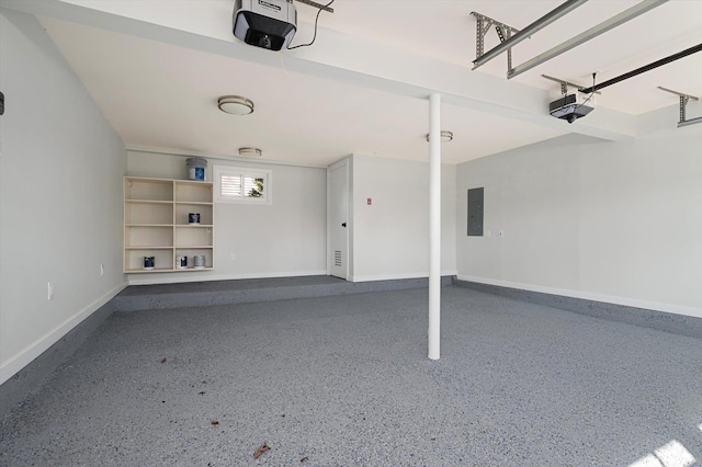 garage with electric panel, baseboards, and a garage door opener