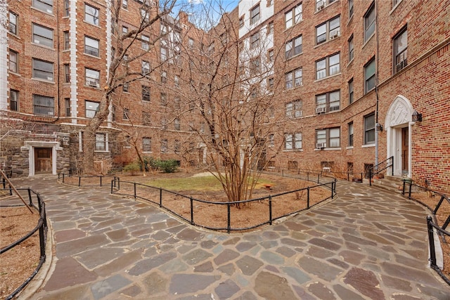 view of home's community featuring entry steps